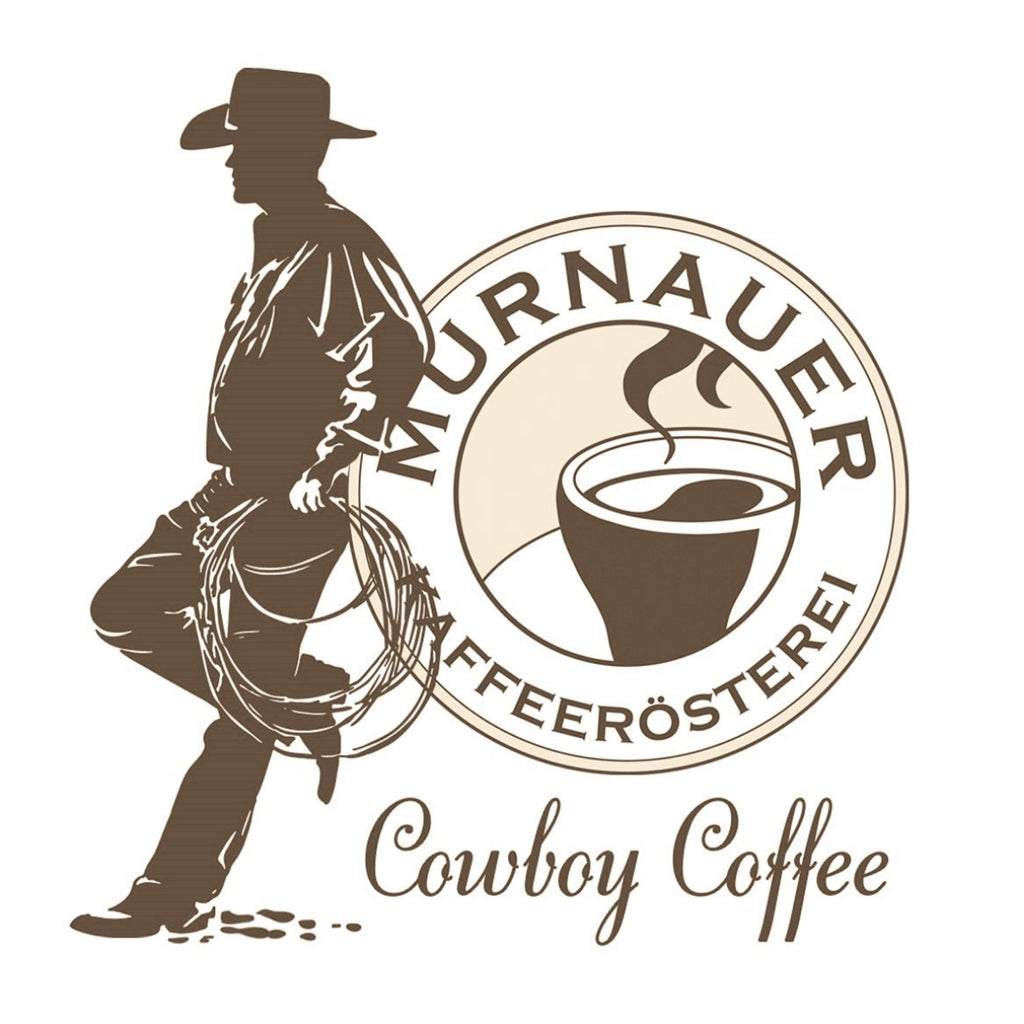 Logo Cowboy Coffee der Murnauer Kaffeerösterei mit brauner Cowboy-Silhouette, Lasso und Kaffeetasse im runden Emblem auf weißem Hintergrund