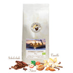 Weiße Kaffeepackung Cowboy Coffee Peru der Murnauer Kaffeerösterei mit Schokolade, Nüssen und Vanille und BIO-Siegel