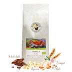 Weiße Kaffeepackung Jamala Indien der Murnauer Kaffeeroesterei mit Tigeretikett, Schokolade, Popcorn, Nougat und Malz vor der Tüte