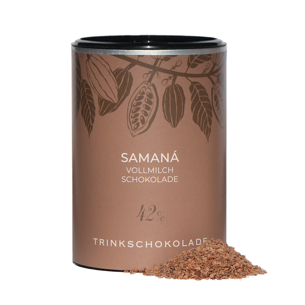 Murnauer Kaffeerösterei: Dose Trinkschokolade Samaná, Vollmilchschokolade, mit braunen Schokoladenraspeln davor